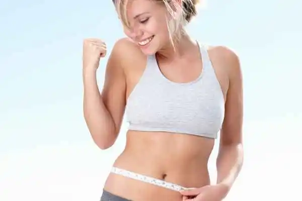 woman happy after fat reduction treatment Kensington