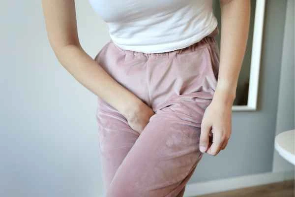 older woman running to the toilet because of urinary incontinence Kensington